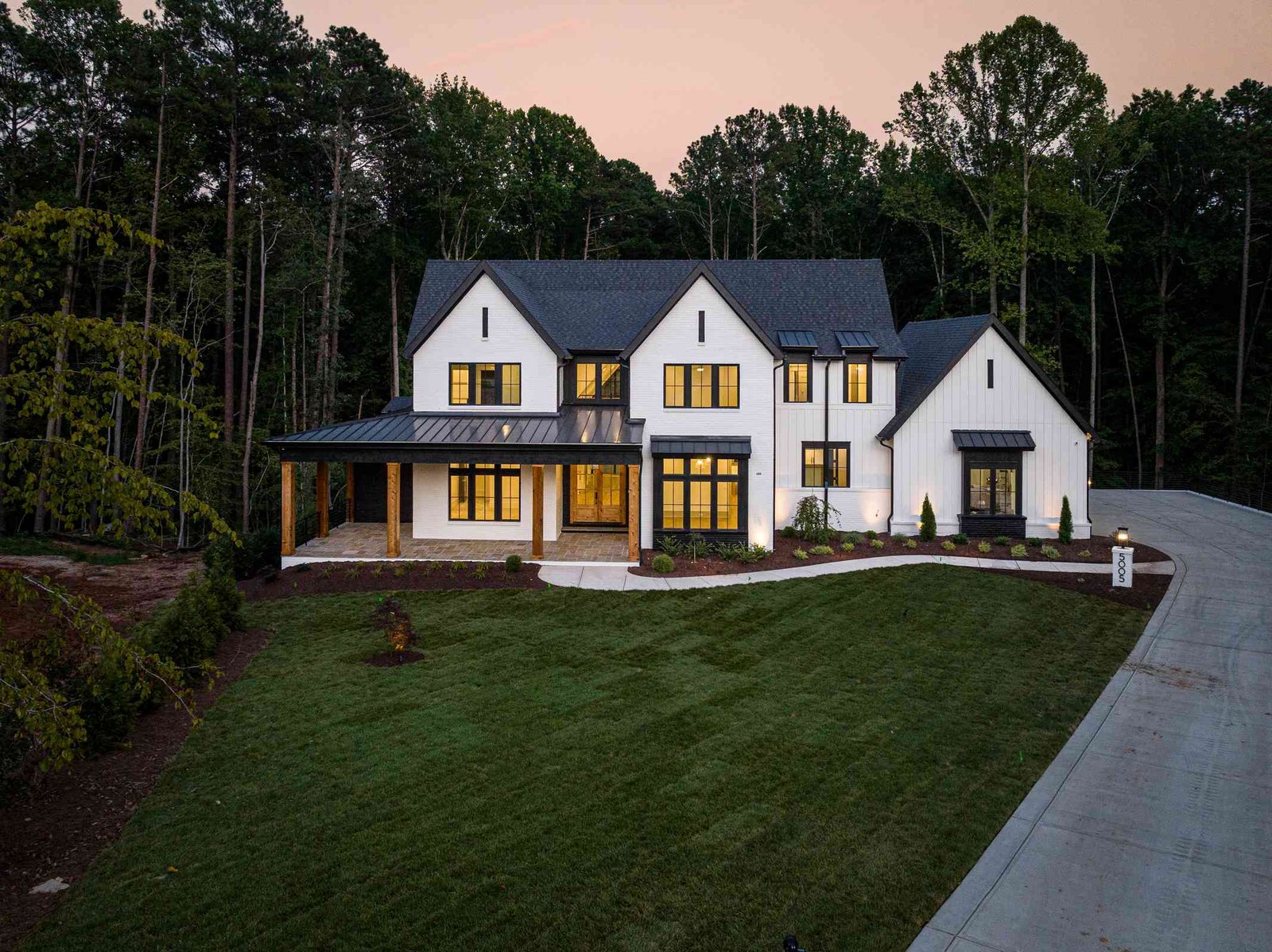 Evening aerial view of a custom estate by Shail Construction in Raleigh NC