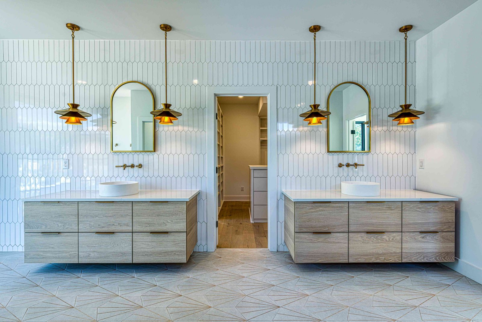 Primary bath wet room with rain shower by Shail Construction in Raleigh NC