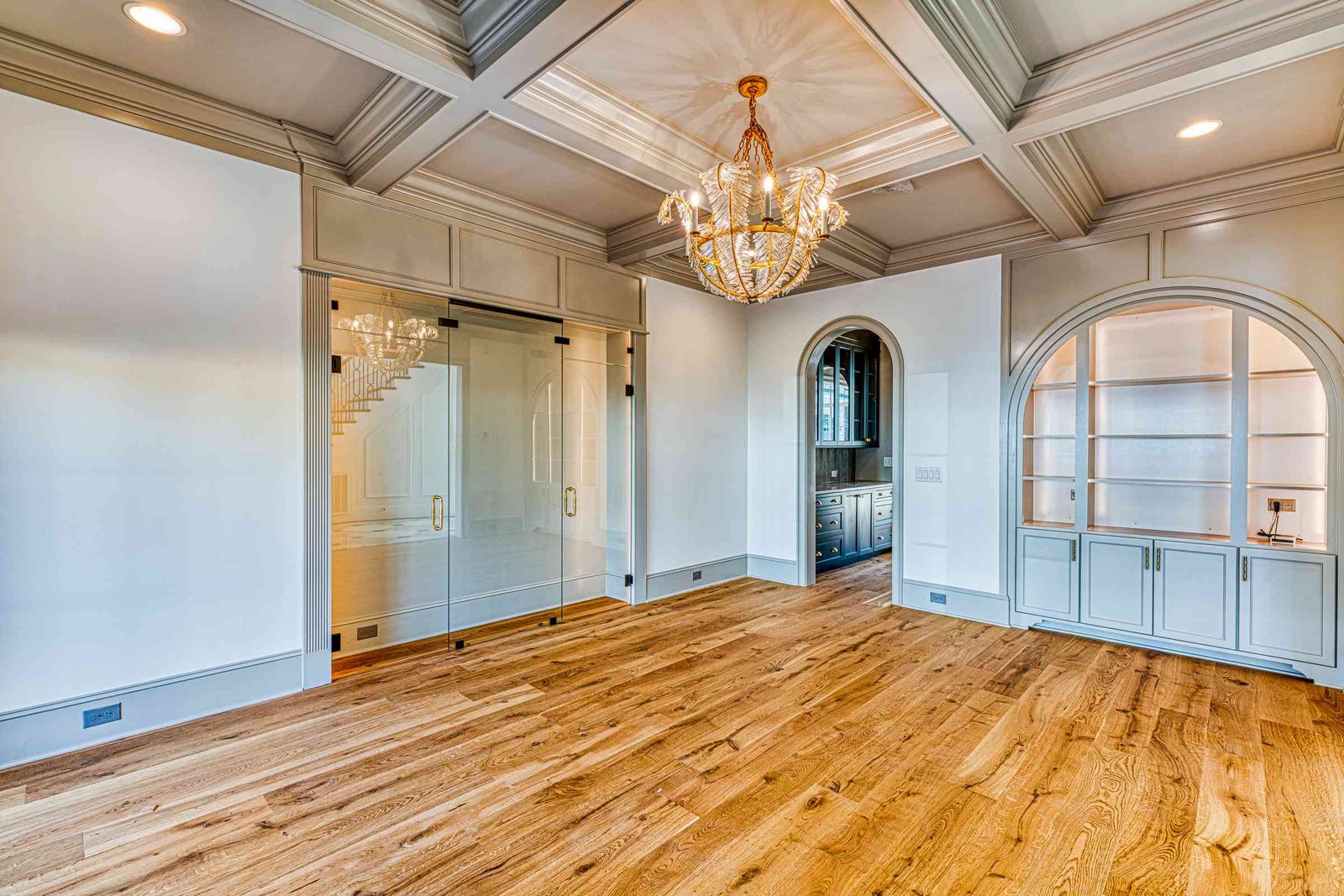 Coffered dining room ceiling with chandelier by Shail Construction in Raleigh NC