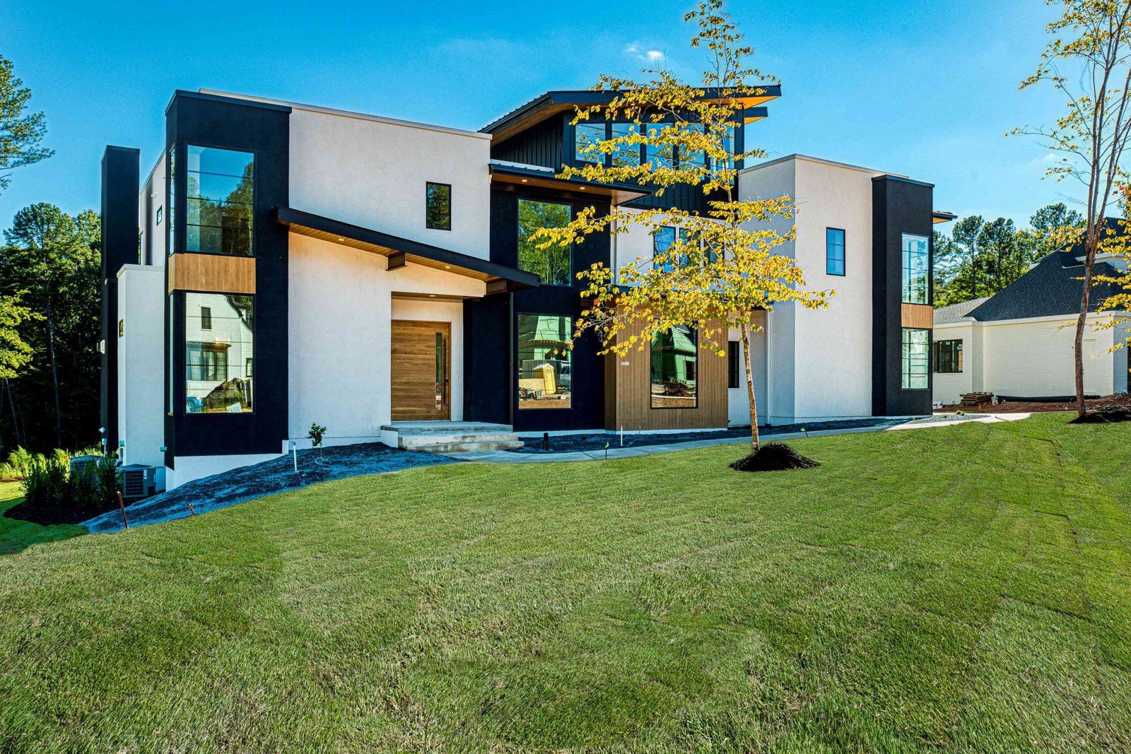Symmetrical front facade with copper accents by Shail Construction in Raleigh NC