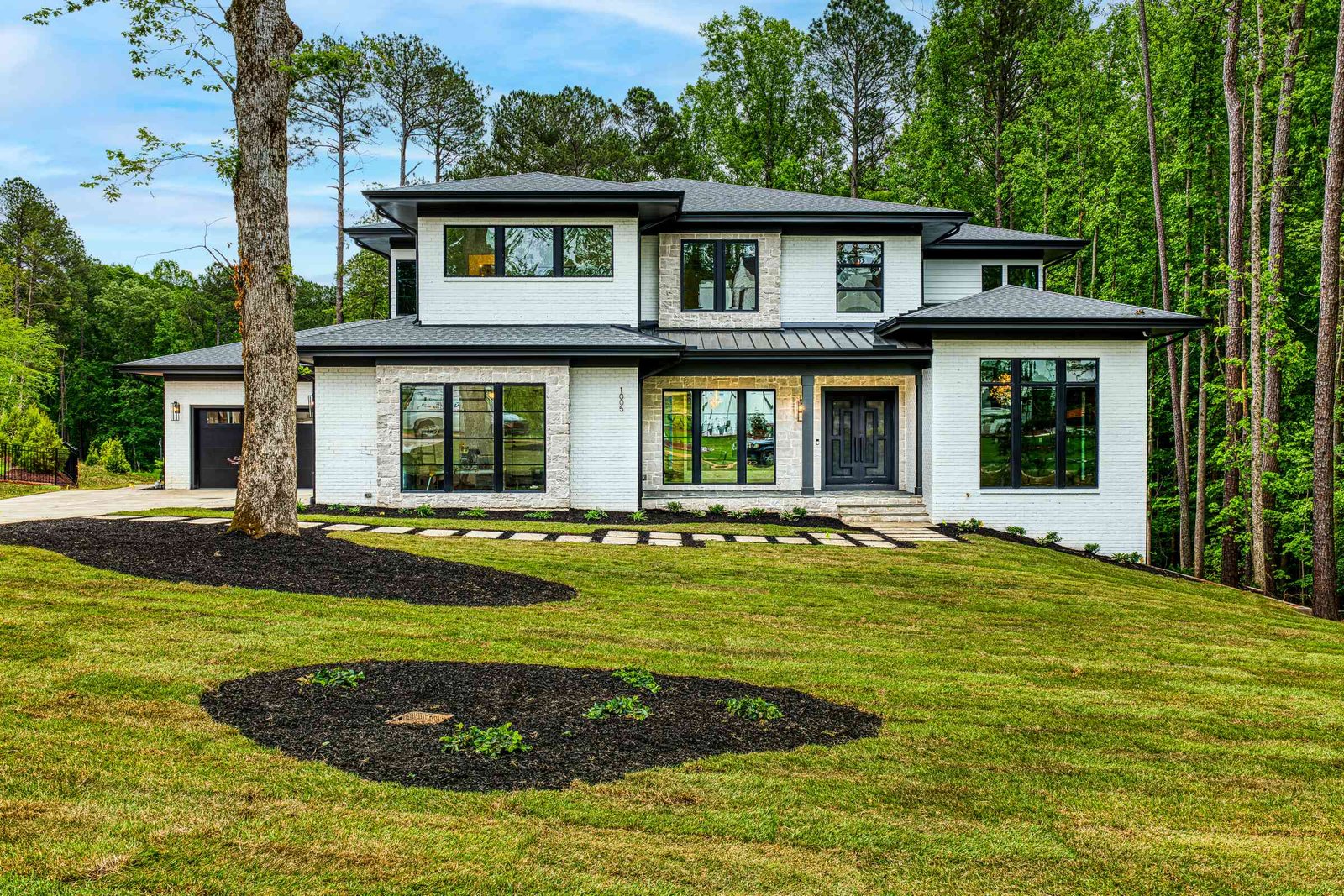 Brick exterior with deep front porch by Shail Construction in Raleigh NC