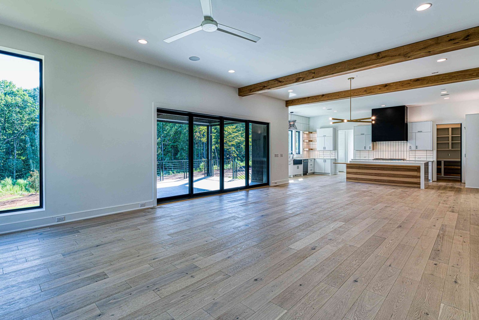 Family room with stone fireplace by Shail Construction in Raleigh NC