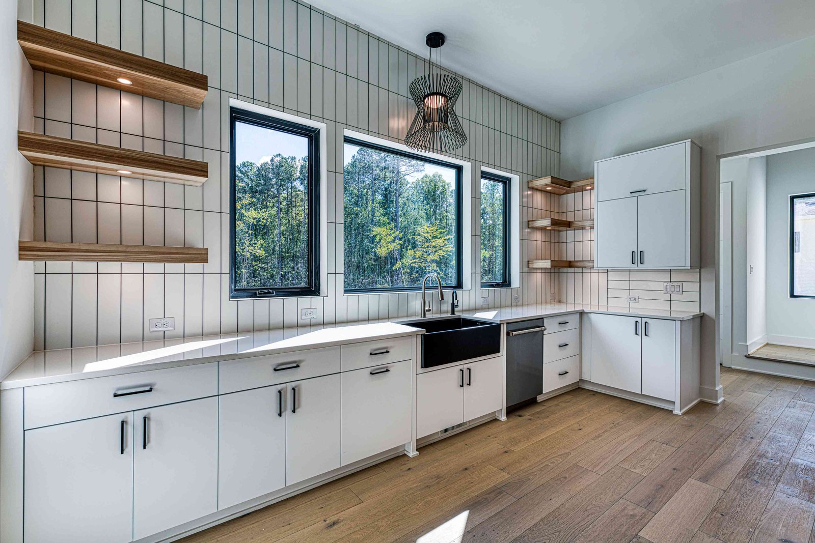 Inset cabinetry kitchen with brass hardware by Shail Construction in Raleigh NC