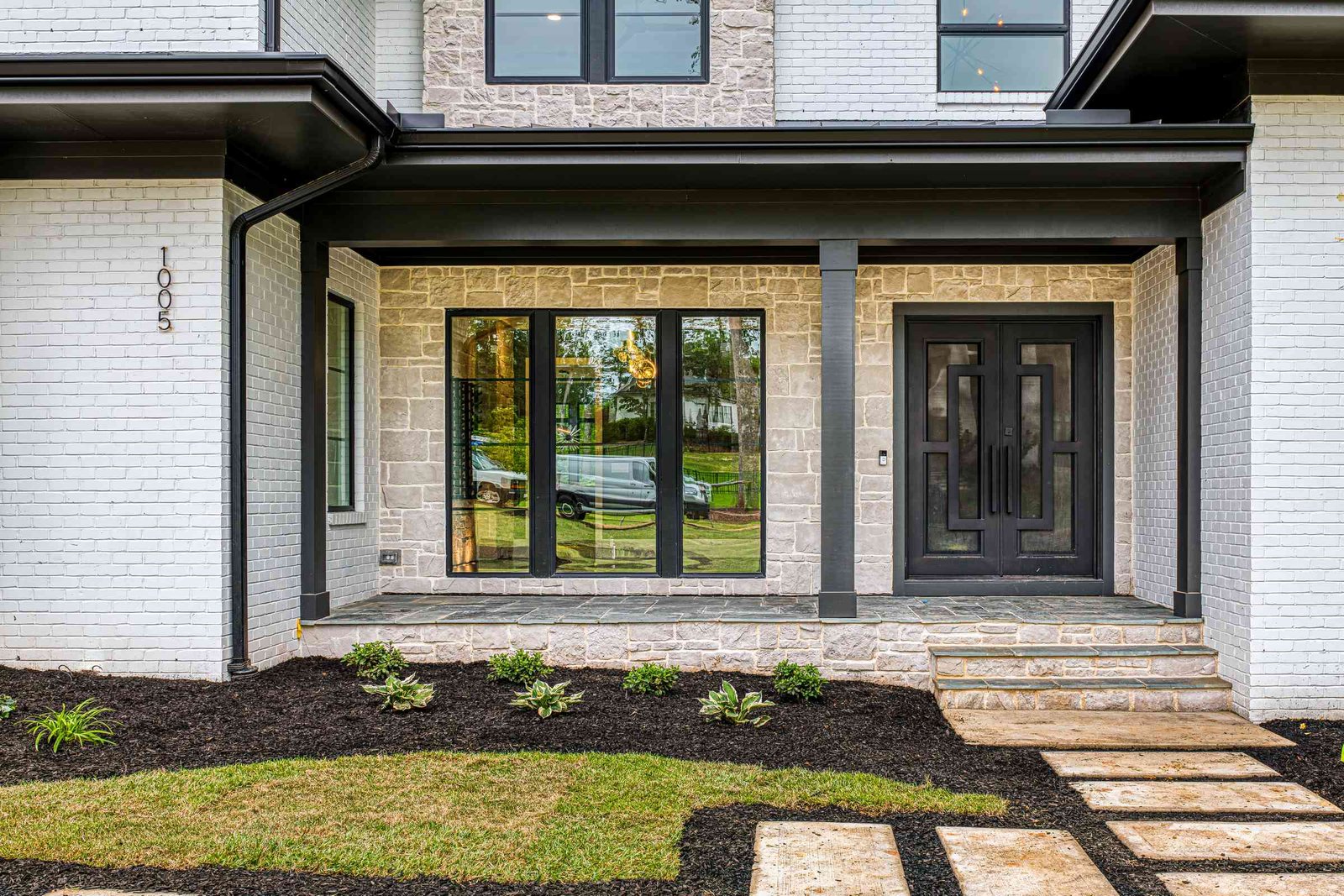 Front porch with rocking chairs by Shail Construction in Raleigh NC