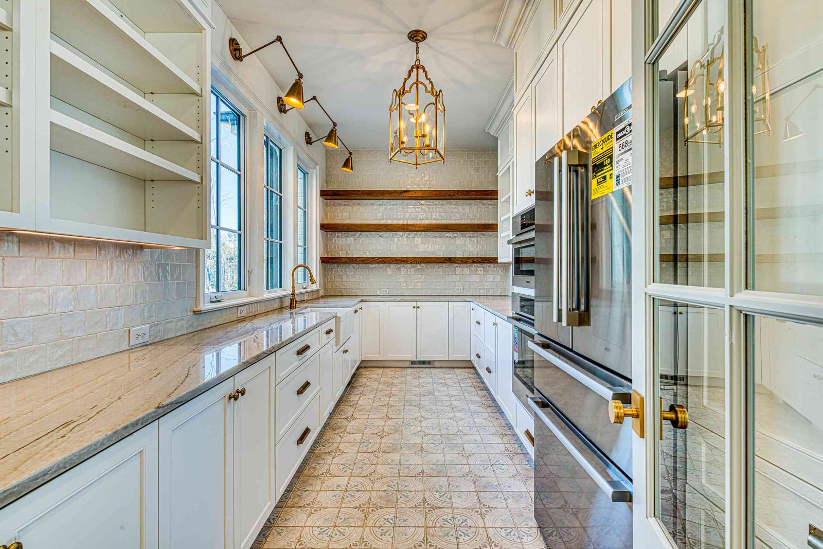 Hidden prep kitchen with full appliance package by Shail Construction in Raleigh NC