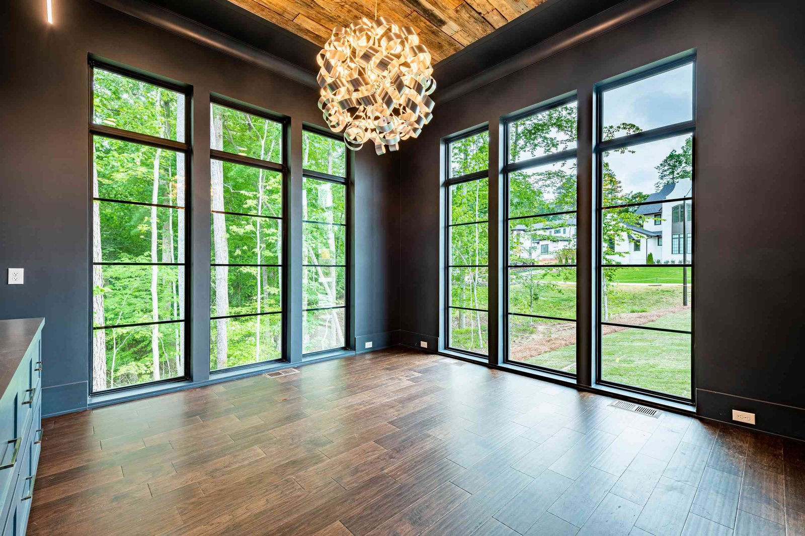 Home office with paneled walls by Shail Construction in Raleigh NC